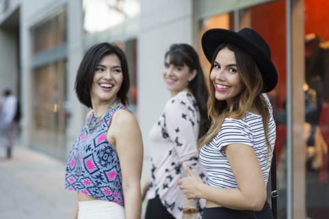 Hispanic woman smiling outdoors