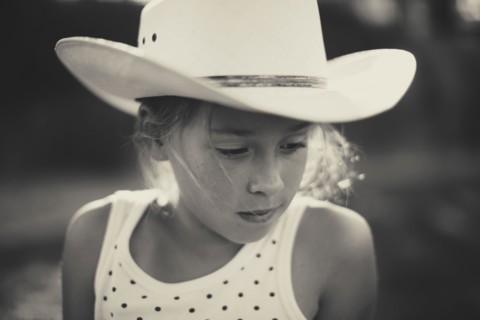 Caucasian girl in cowboy hat