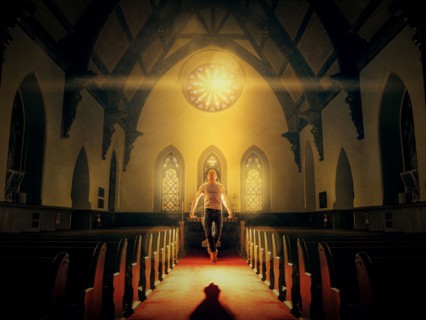 Caucasian man floating in church