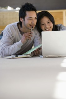Asian businessman working on floor