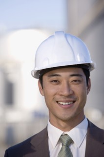 Asian businessman wearing hardhat