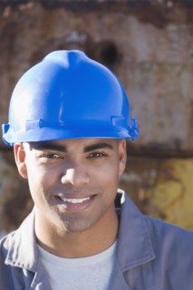 African American male construction worker wearing hardhat