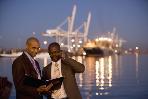 African American businessmen looking at paperwork
