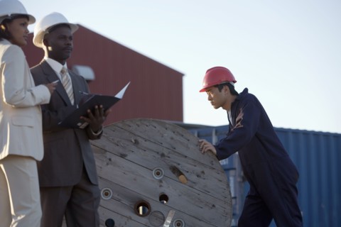 African American businesspeople at commercial pier