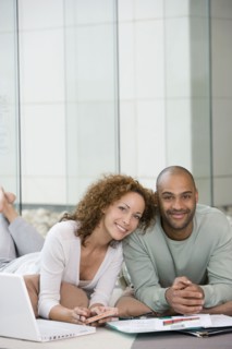African couple working at home