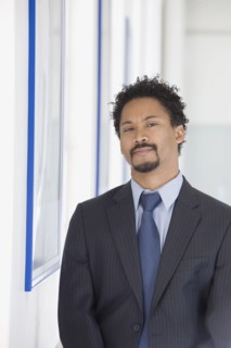 Serious African businessman with goatee