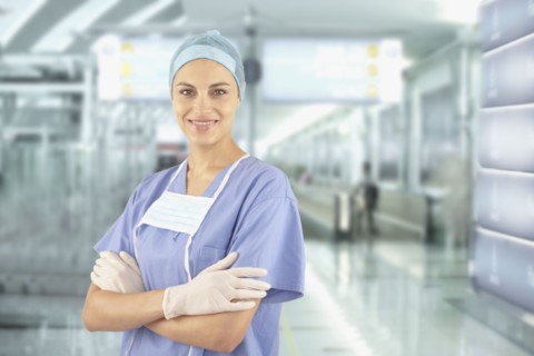 Mixed race doctor wearing scrubs in hospital