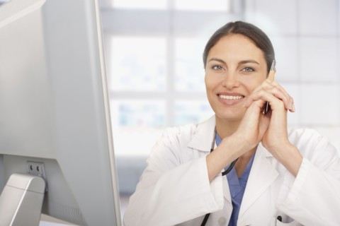 Mixed race doctor working in hospital