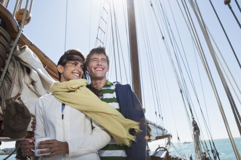 Caucasian couple on sailboat