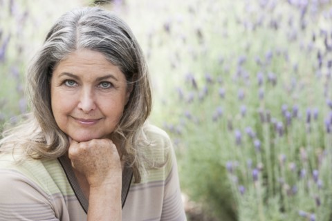 Senior Caucasian woman relaxing outdoors