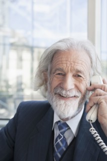Senior Caucasian businessman talking on phone