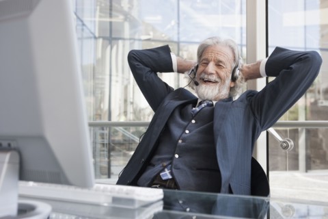 Senior Caucasian businessman talking on headset