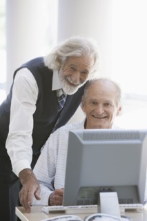 Senior Caucasian businessmen working together in office