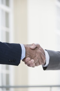 Caucasian businessmen shaking hands