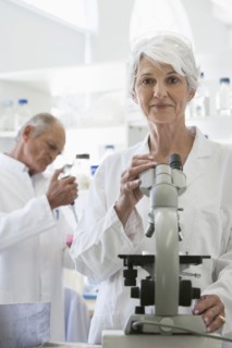 Senior Caucasian scientists working in lab