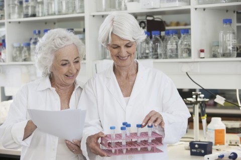 Senior Caucasian scientists working in lab