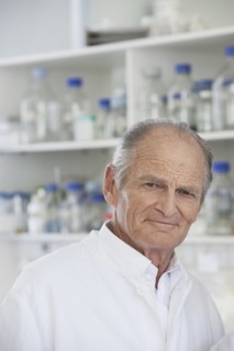 Senior Caucasian scientist working in lab