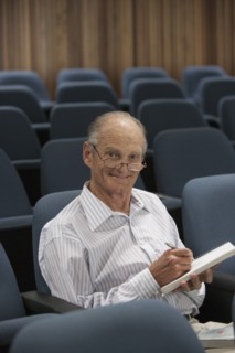 Senior Caucasian student working in classroom