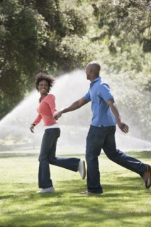 Couple running in park