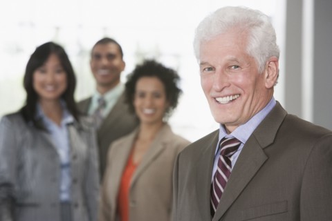 Business people smiling in office