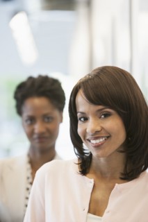 Businesswomen smiling in office