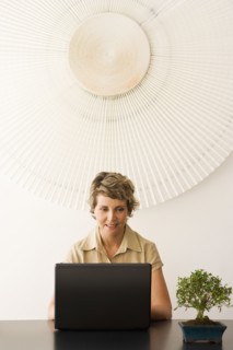Businesswoman working at desk in office