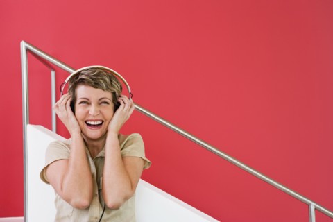 Woman listening to headphones