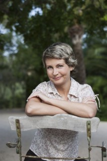 Woman sitting in chair outdoors