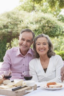 Couple eating together outdoors