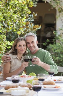 Couple eating together outdoors