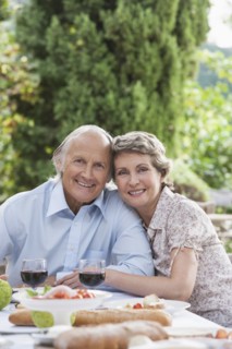 Couple eating together outdoors