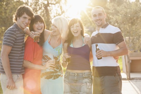 Friends drinking together at party