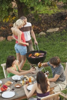 Friends eating together outdoors