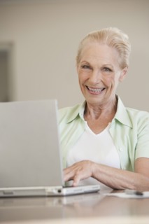 Senior Caucasian woman using laptop