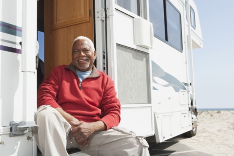 Mixed race Senior man smiling in RV