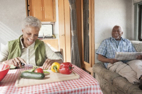 Mixed race Senior couple relaxing in RV