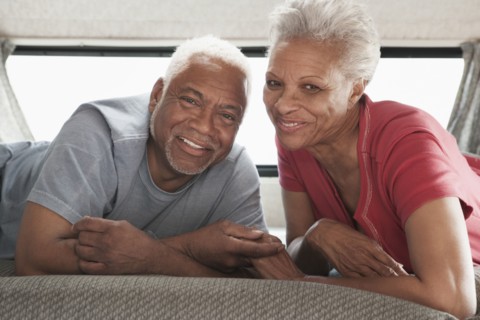 Mixed race Senior couple relaxing in RV
