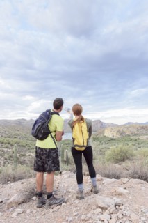 Couple admiring scenic view in desert