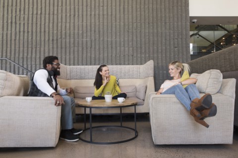 Friends hanging out in lounge