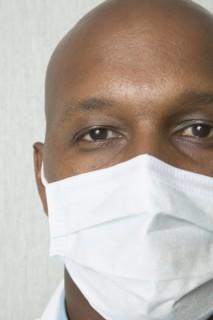 Close up of African man wearing surgical mask
