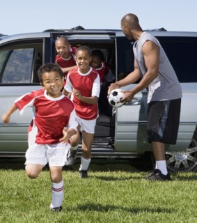 Multi-ethnic children in soccer uniforms