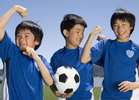 Asian boys with soccer ball
