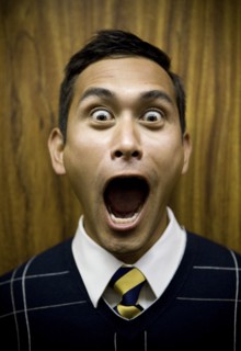Shouting mixed race businessman