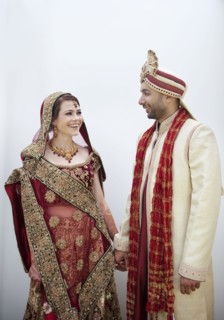 Bride and groom in traditional Indian wedding clothing