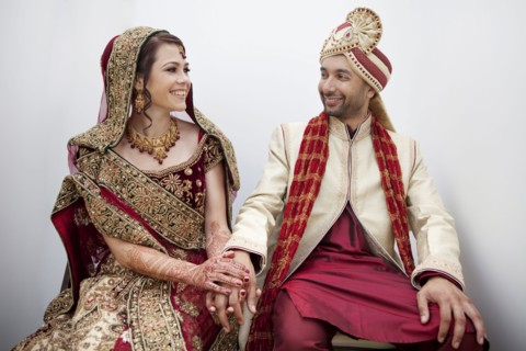 Bride and groom in traditional Indian wedding clothing