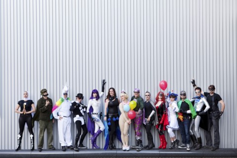 People dressed in superhero costumers