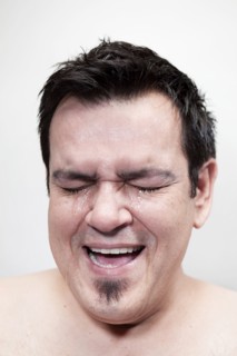 Hispanic man crying