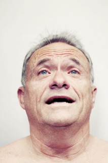 Older Caucasian man crying