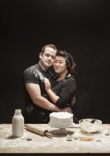 Messy couple baking cake