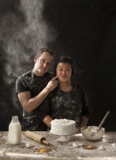Messy couple baking cake
